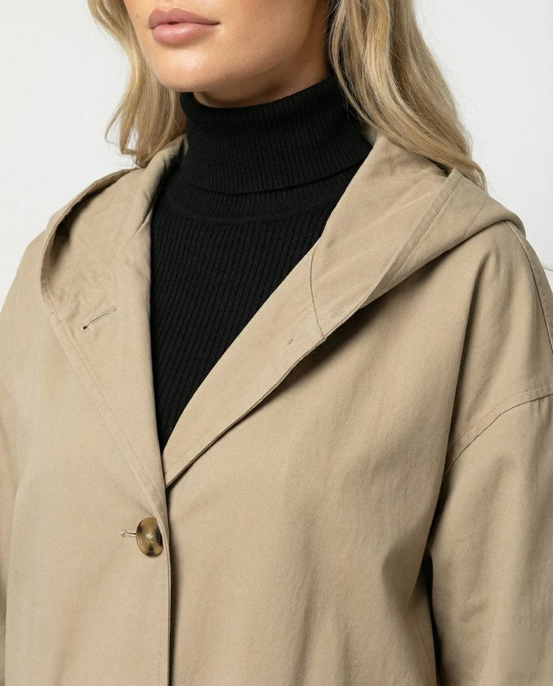 Women's Long Hooded Trench Coat with Button Closure and Flap Pockets