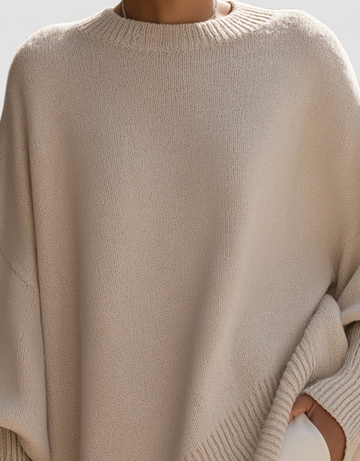 Women's Oversized Knit Jumper with Round Neck and Asymmetric Hem