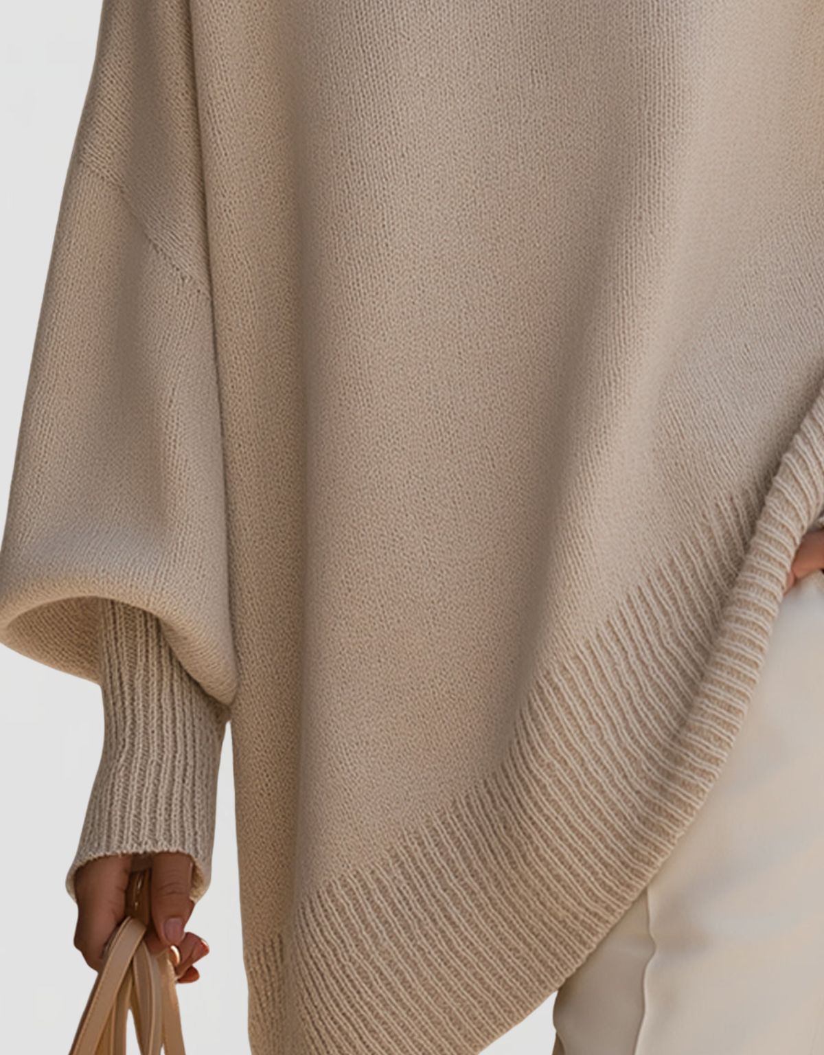 Women's Oversized Knit Jumper with Round Neck and Asymmetric Hem