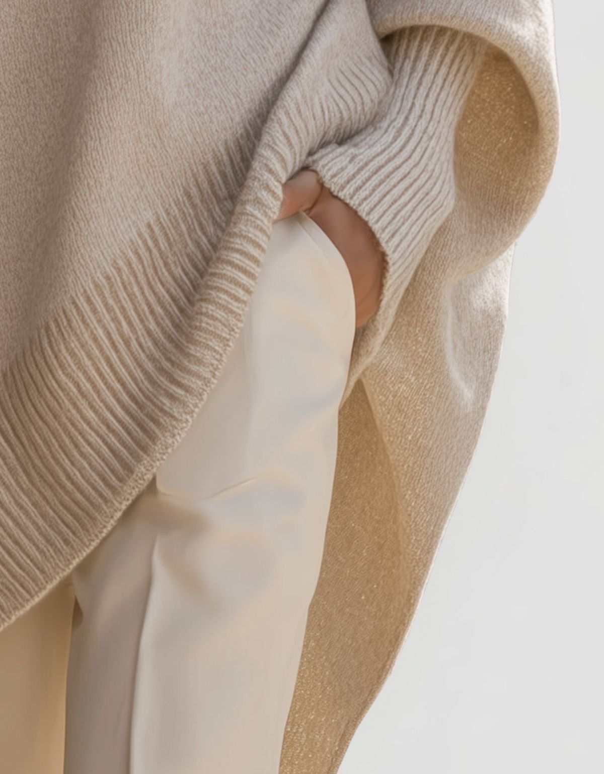 Women's Oversized Knit Jumper with Round Neck and Asymmetric Hem